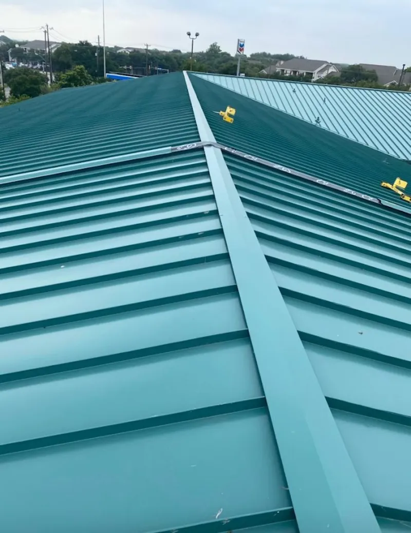 Green commercial metal roof ridge and valley for Metal Roof Repair in Happy Valley